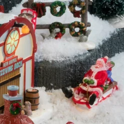 LEMAX Personnage Père Noël en luge Sale