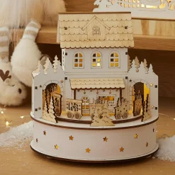 KAEMINGK Village de Noël en bois lumineux et musical à piles (H19 cm) Maison de famille Sale