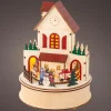 KAEMINGK Village de Noël en bois lumineux et musical à piles (H20 cm) Maison joyeuse Colorée Best